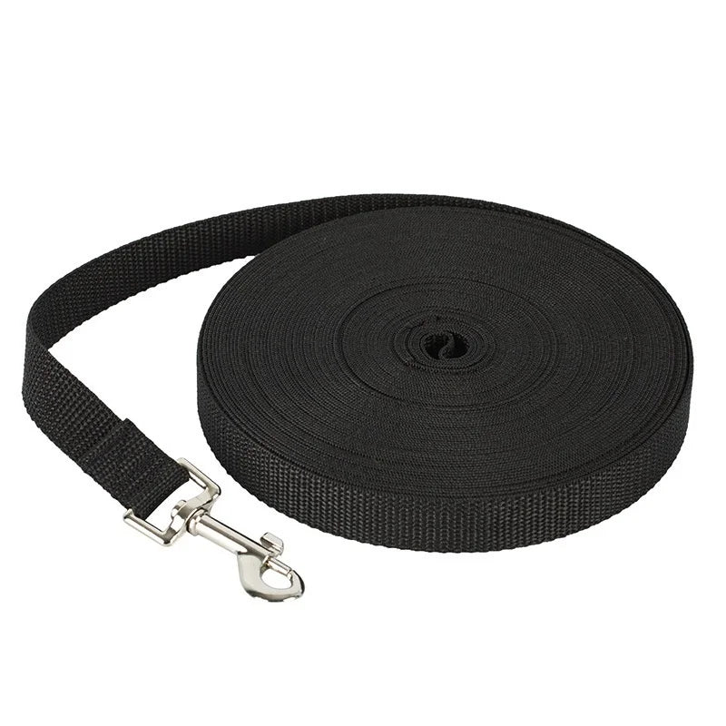 Black durable nylon dog training leash with a metal clip and coiled strap.