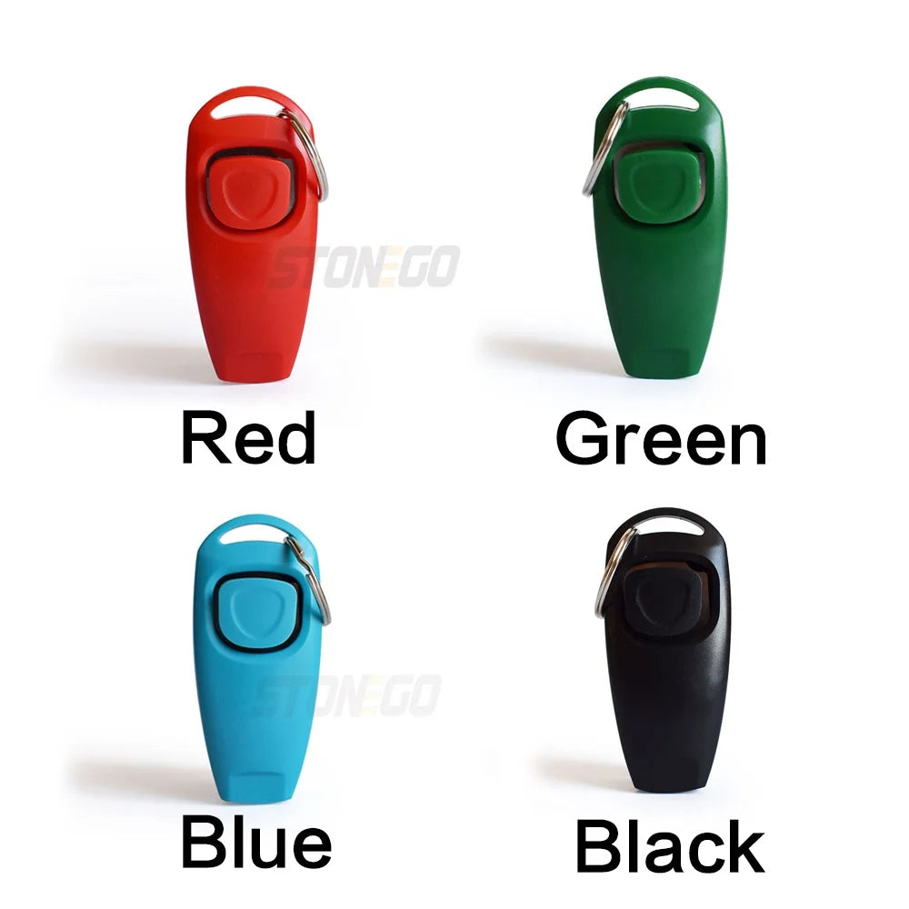 A set of five colored dog training clickers and whistles in red, green, blue, and black.