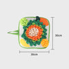 A green fabric mat shaped like a large orange flower with green leaves and small yellow accents for pet sniffing training.