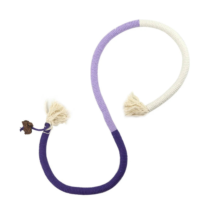 Interactive teeth grinding rope toy for cats with purple and white braided rope.