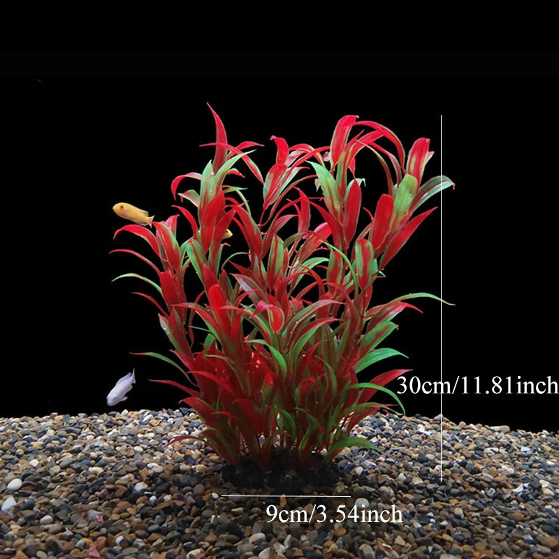 Un touffe de plantes aquatiques artificielles rouges vives plantées dans du gravier sombre.