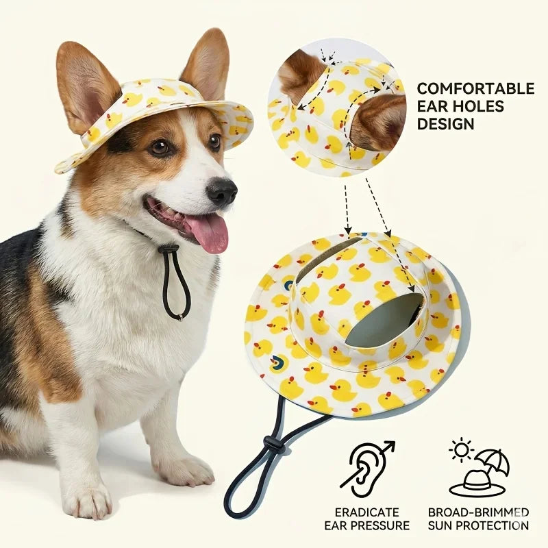 A dog wearing a yellow duck print pet cap designed for comfortable ear holes and sun protection.