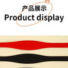 Two leather dog collars, one red and one black, are displayed on a light surface.