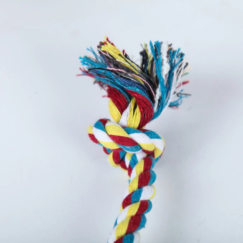 A bundle of colorful, fluffy cotton rope with blue, yellow, and red strands.