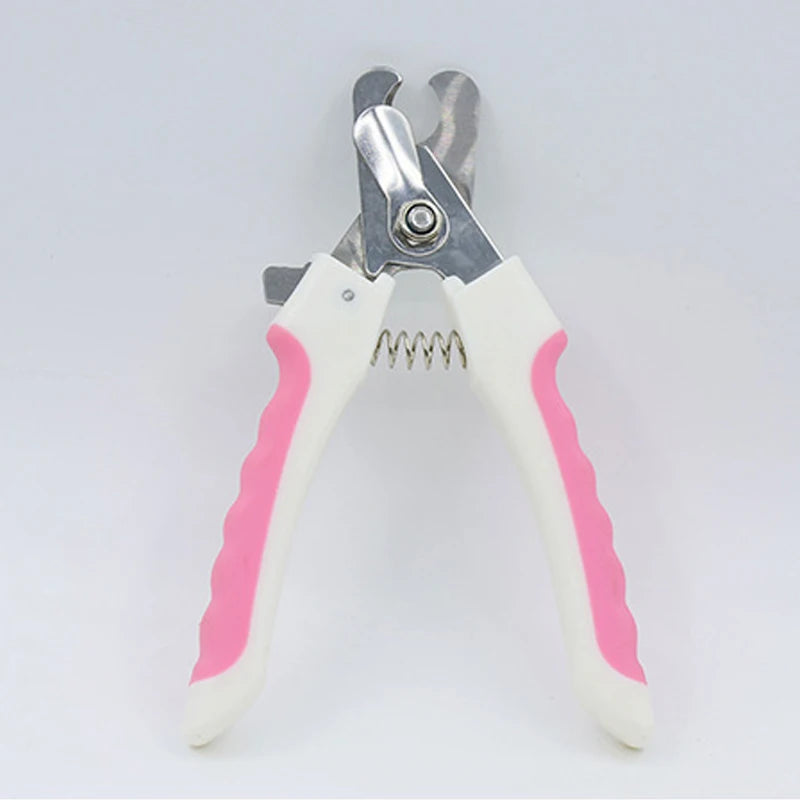 Stainless steel pet nail clippers with white handles and pink accents for dogs and cats
