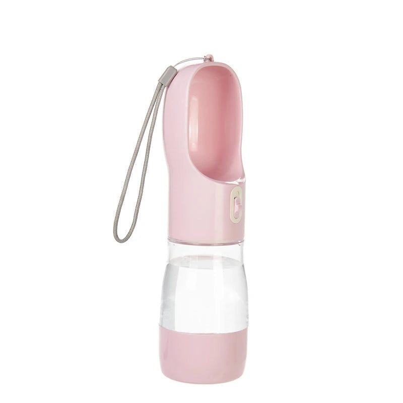 A pink portable 2-in-1 dog water bottle and food dispenser with a flexible tube.