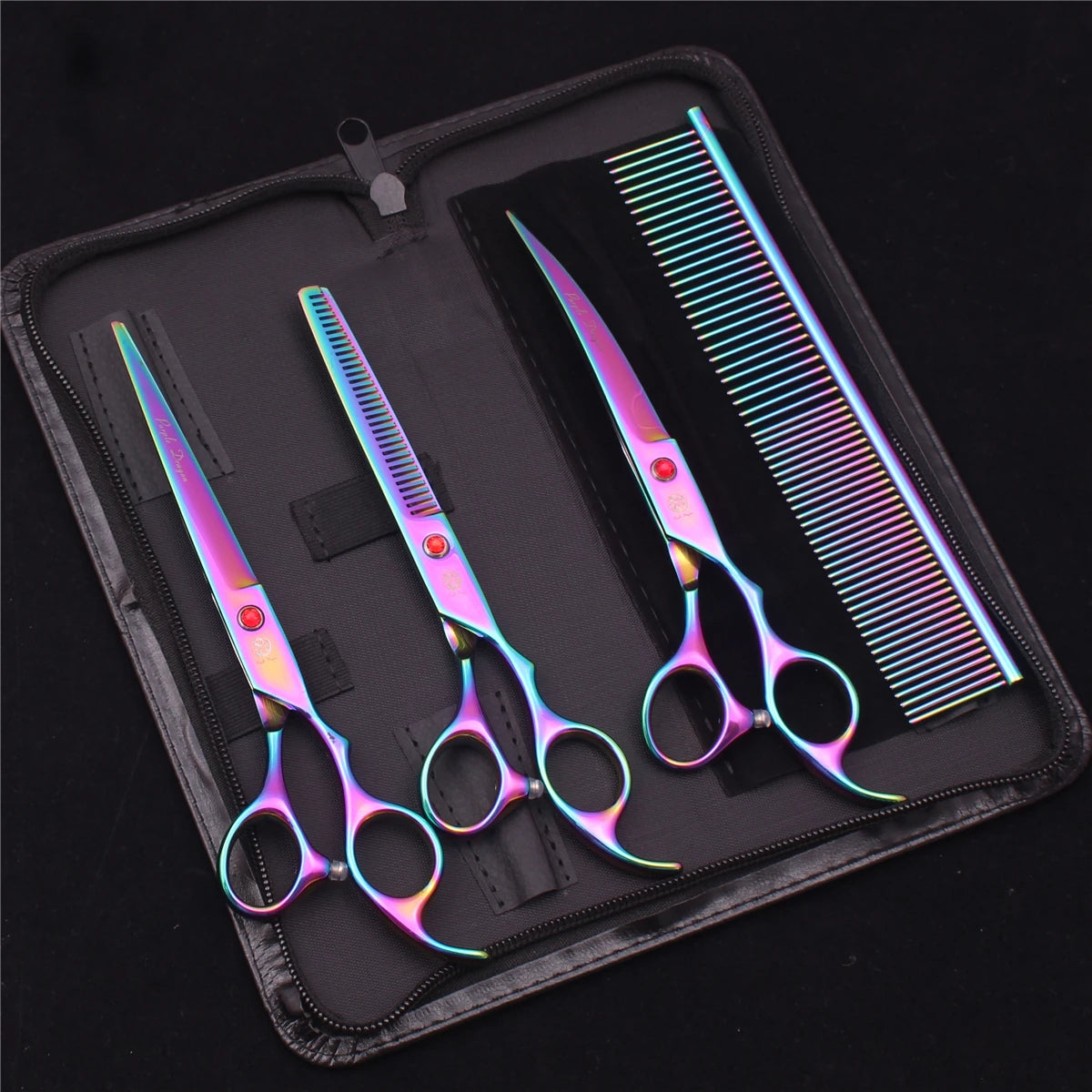 A professional stainless steel pet grooming scissors set with a comb displayed inside a black zippered case.