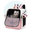 A pink and black ventilated cat carrier backpack with adjustable straps.