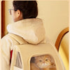Eine beige Katze-Rucksackhalterung mit Fenster für das Tier.