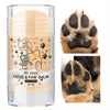 A glass jar of soothing paw and nose balm for pets next to close-ups of dog and cat paws