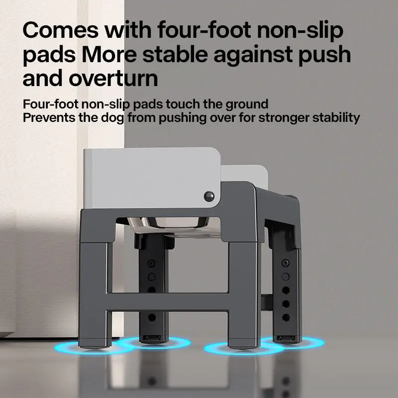 A gray collapsible elevated dog feeder with double stainless steel bowls shown on a surface.