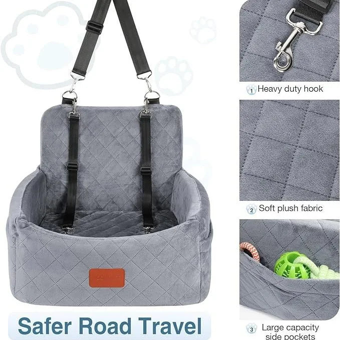A gray quilted dog car seat with a black harness and hook, designed for safe road travel.