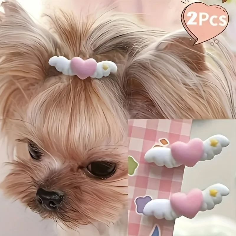 Two heart-shaped mini pet hair clips in pink and white are shown on a dog's fur.