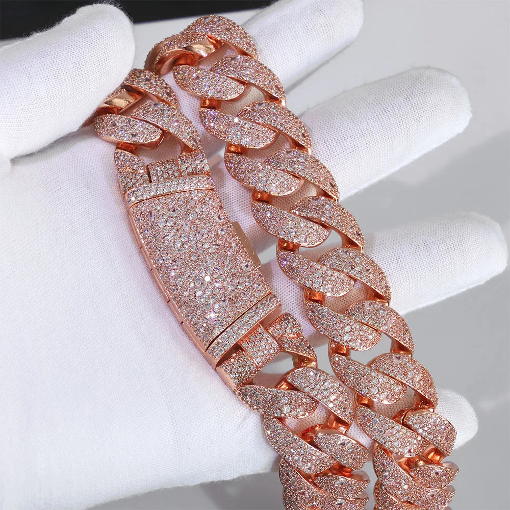 Rose gold plated curved flip buckle Cuban link necklace displayed on a hand