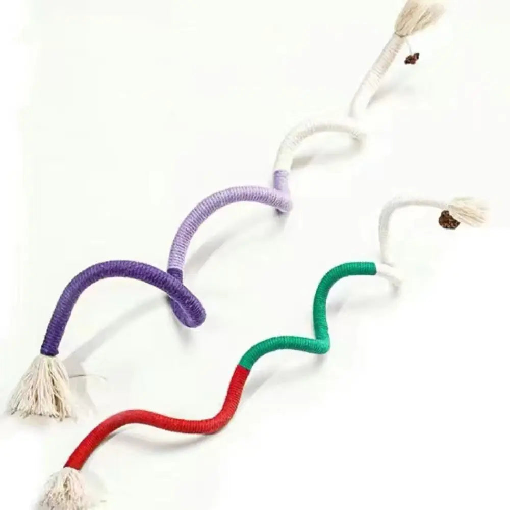 A collection of colorful cotton rope cat teaser toys with tassels in purple, white, and green.