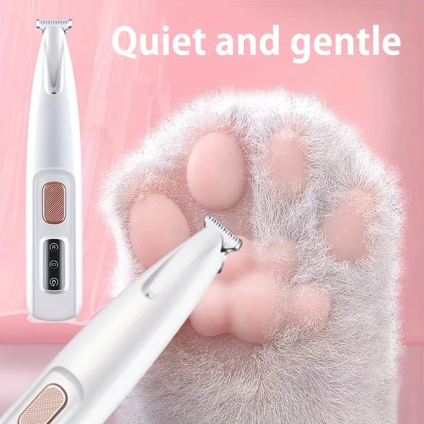 A white pet paw trimmer is shown being used on a cat's paw, emphasizing quiet and gentle grooming.