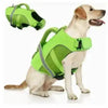 A bright lime green adjustable dog life jacket is shown on a light-colored dog.