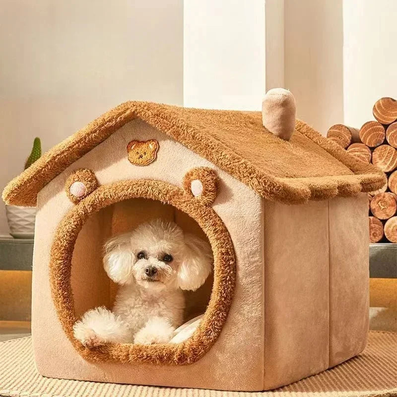 A beige pet house with a wooden roof and an arched entrance, containing a small white dog.