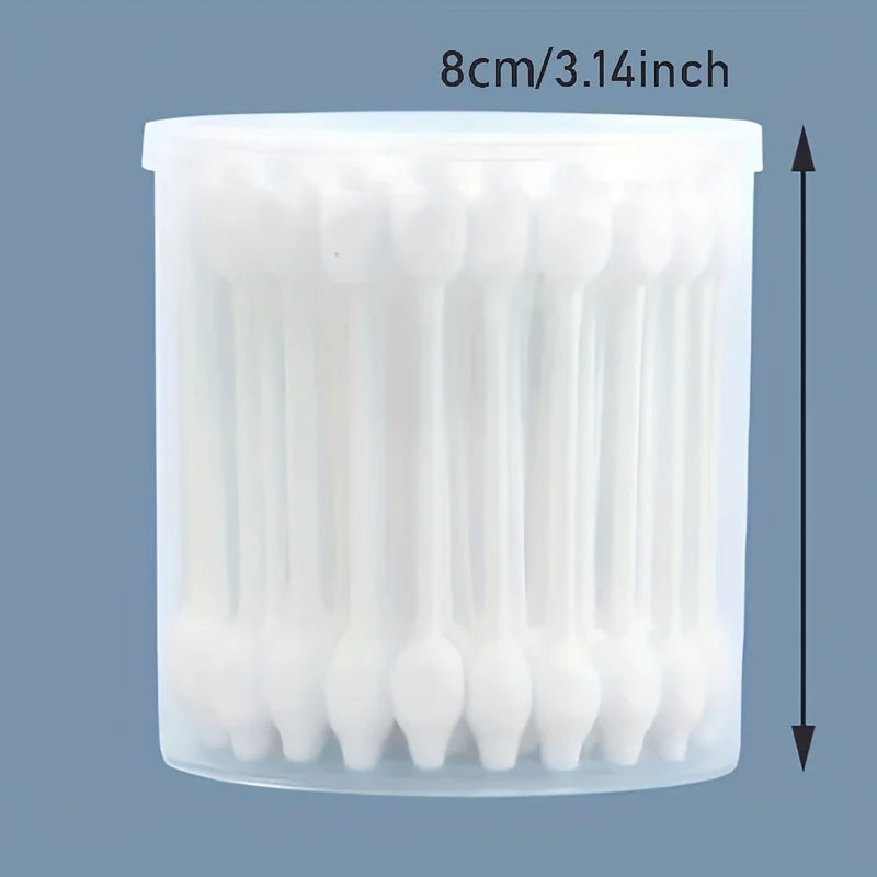 A clear plastic container filled with numerous white cotton swabs for pet ear cleaning.