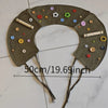 A handmade felt headband decorated with various colored buttons and star shapes for a parrot anti-plucking and biting coat.