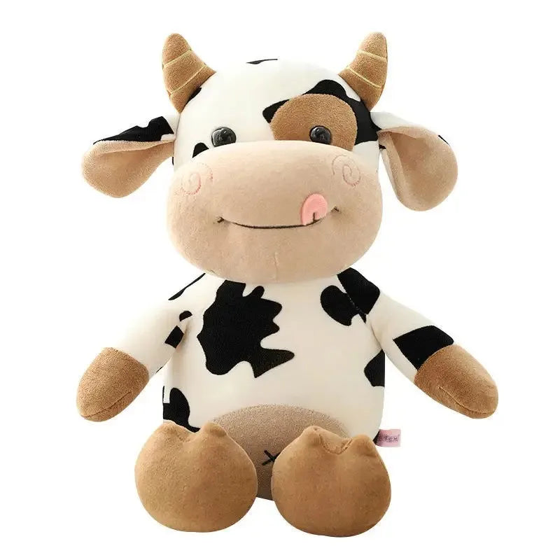A white and black cow plush toy with brown accents, featuring a cute, smiling face.