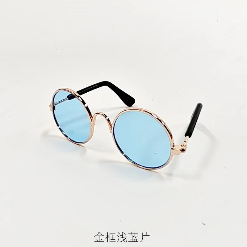 Gold-plated round sunglasses with black frames