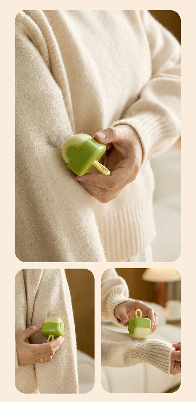 Eine Hand hält einen limettengrünen wiederverwendbaren Fasernentfernerroller gegen einen beigen Strickpullover.