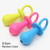 A set of five colorful squeaky chew toys for dogs, including yellow, pink, and blue options.