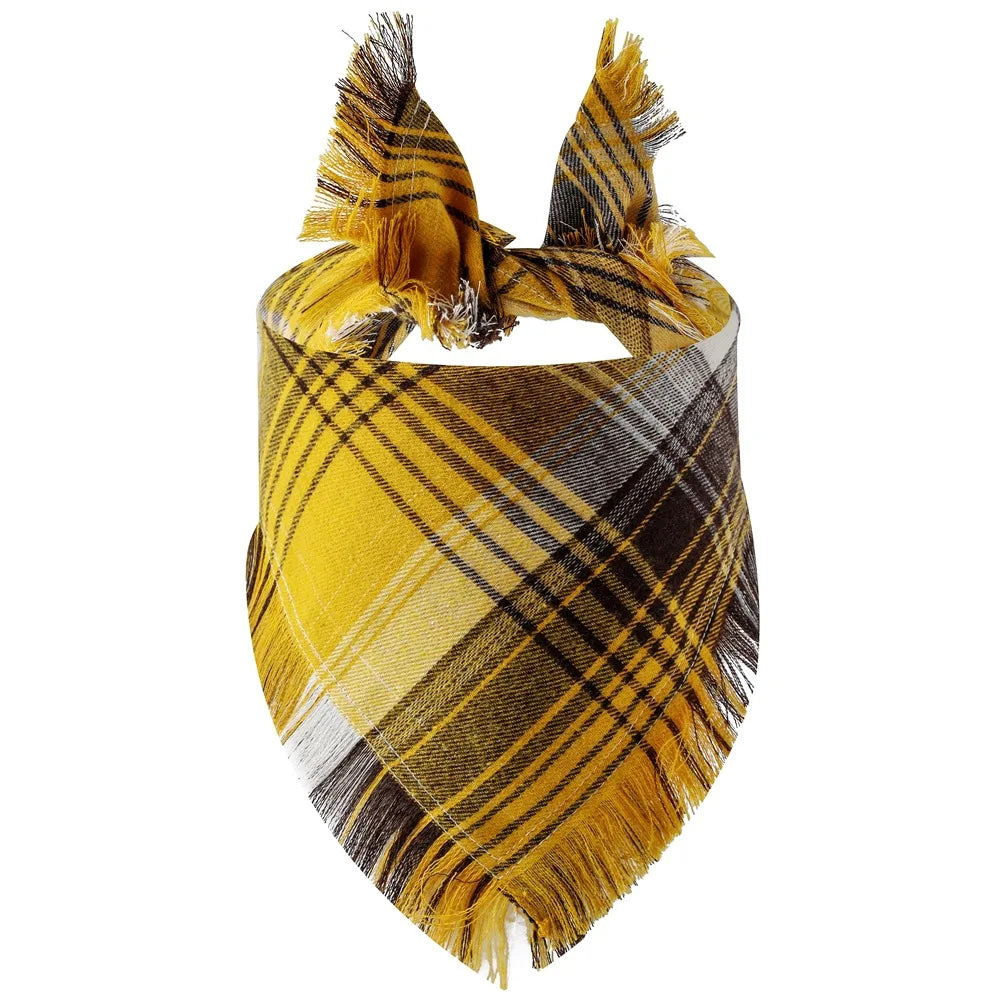 A yellow and black plaid dog bandana with fringed edges.