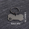 A silver bone-shaped dog ID tag with a keyring, measuring 5cm long and 2.8cm high.