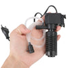 A hand holds a compact submersible aquarium filter with oxygenation, featuring a black housing and clear tubing.