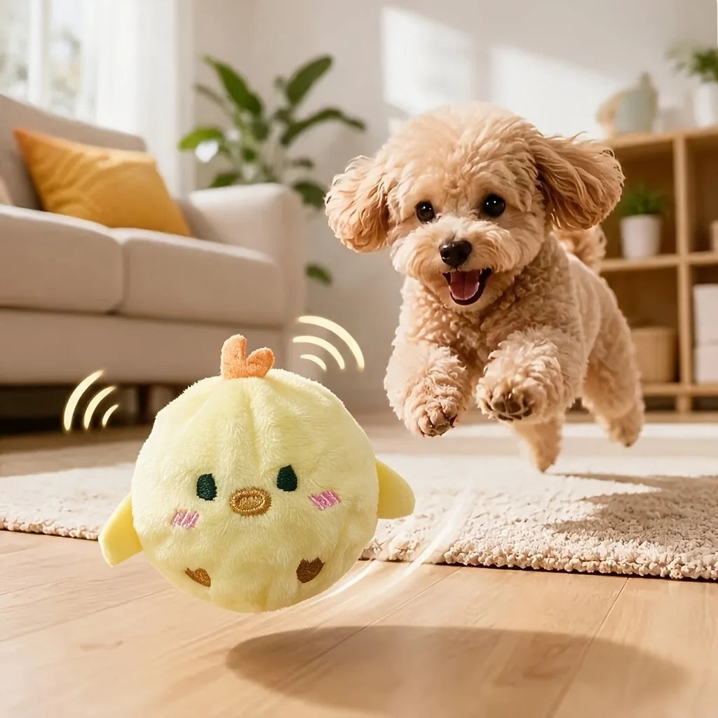 A fluffy yellow squeaky bouncing chick ball for pets is shown jumping on a wooden floor.