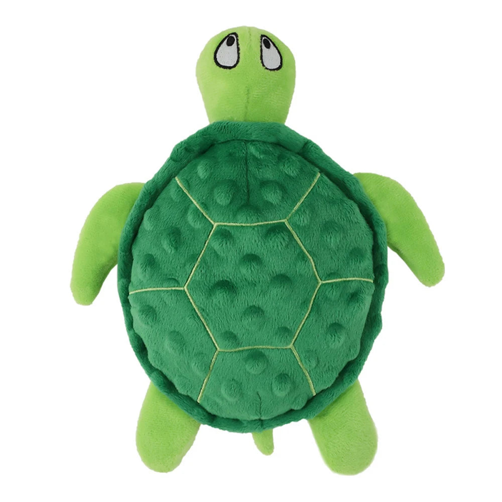 A bright green interactive sea turtle plush toy with a textured shell and small eyes.