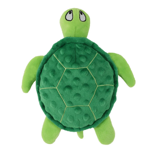 A bright green interactive sea turtle plush toy with a textured shell and small eyes.