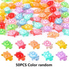 A collection of 50 colorful resin turtle ornaments in various shades and sizes for home decor