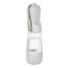 A white 2-in-1 portable pet water and food dispenser with a clear reservoir and a silicone strap.
