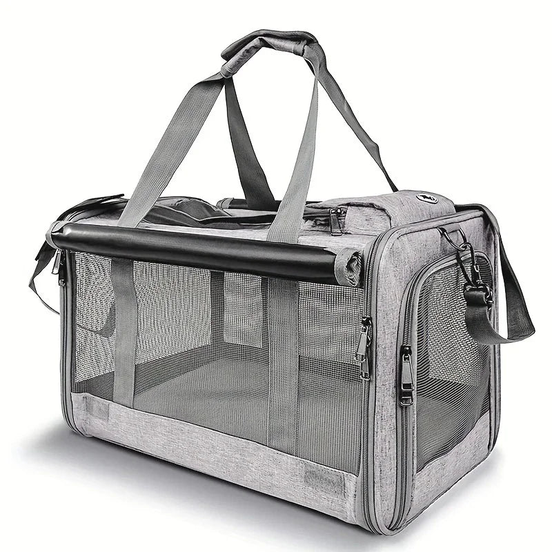 A gray breathable mesh pet carrier bag for cats and small dogs with carrying handles.