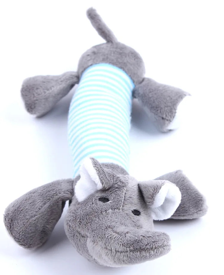 A gray plush elephant toy with a blue striped tube attached.