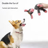 A fluffy dog is interacting with a handmade plush squeaky donkey toy.
