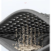 A close-up view of a honeycomb large hole diameter bath sand for use mat showing cat litter falling through the holes.