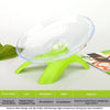 Helle limettengrüne transparente Laufrolle für kleine Haustiere mit einer klaren Plastiktrommel.