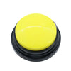 A round, bright yellow pet communication button with a black base for dog training.