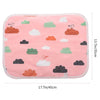 Pink reusable absorbent pee pad featuring various cloud and bird patterns for small pet cages