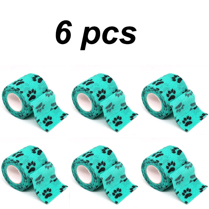 Six rolls of teal pet puppy anti-dirt leggings for walking dogs.