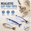 A tabby cat plays with a realistic cat fish toy, which is USB rechargeable.