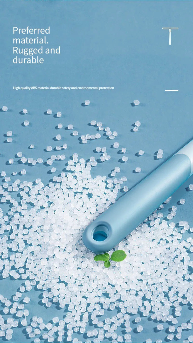 A light blue silicone shower squeegee is shown resting on a pile of white, irregular silicone material.