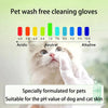 A cat is holding a pink pet wash free cleaning glove and tissue for skin care.