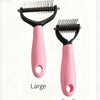 A pair of pink stainless steel pet grooming combs, labeled large and small.