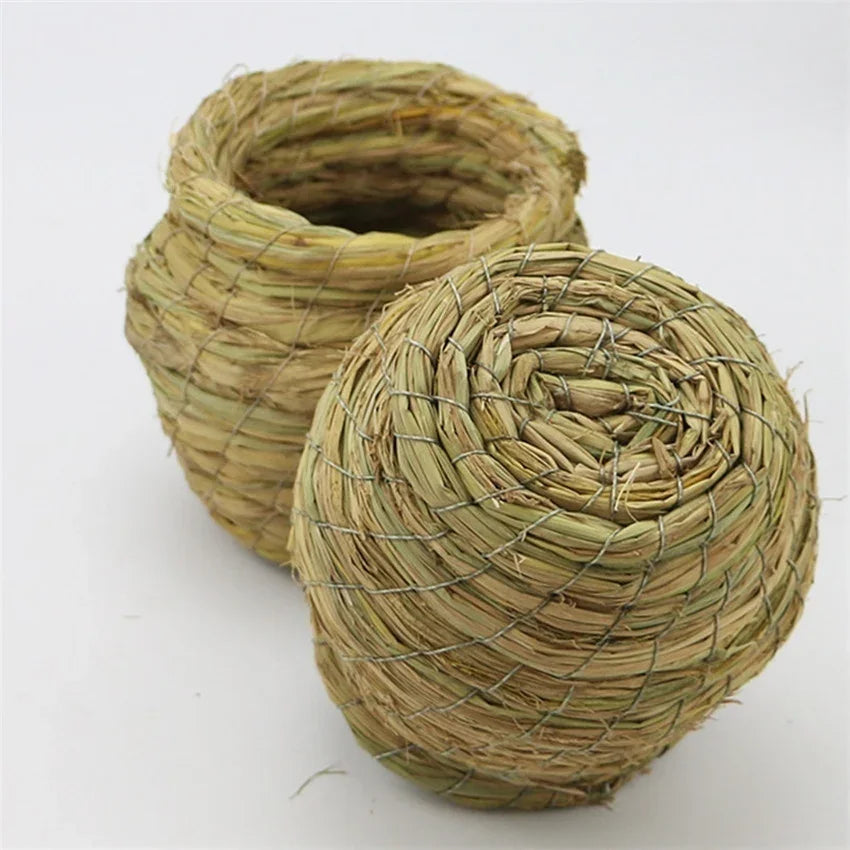 A tightly woven natural straw bird nest for pet avians.