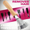 A wooden hairbrush cleaner with bristles is shown alongside various hair tools, demonstrating its ability to remove hair.
